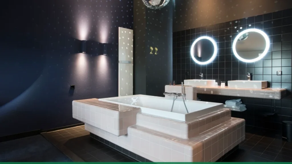 A contemporary bathroom with illuminated mirrors and soft lighting