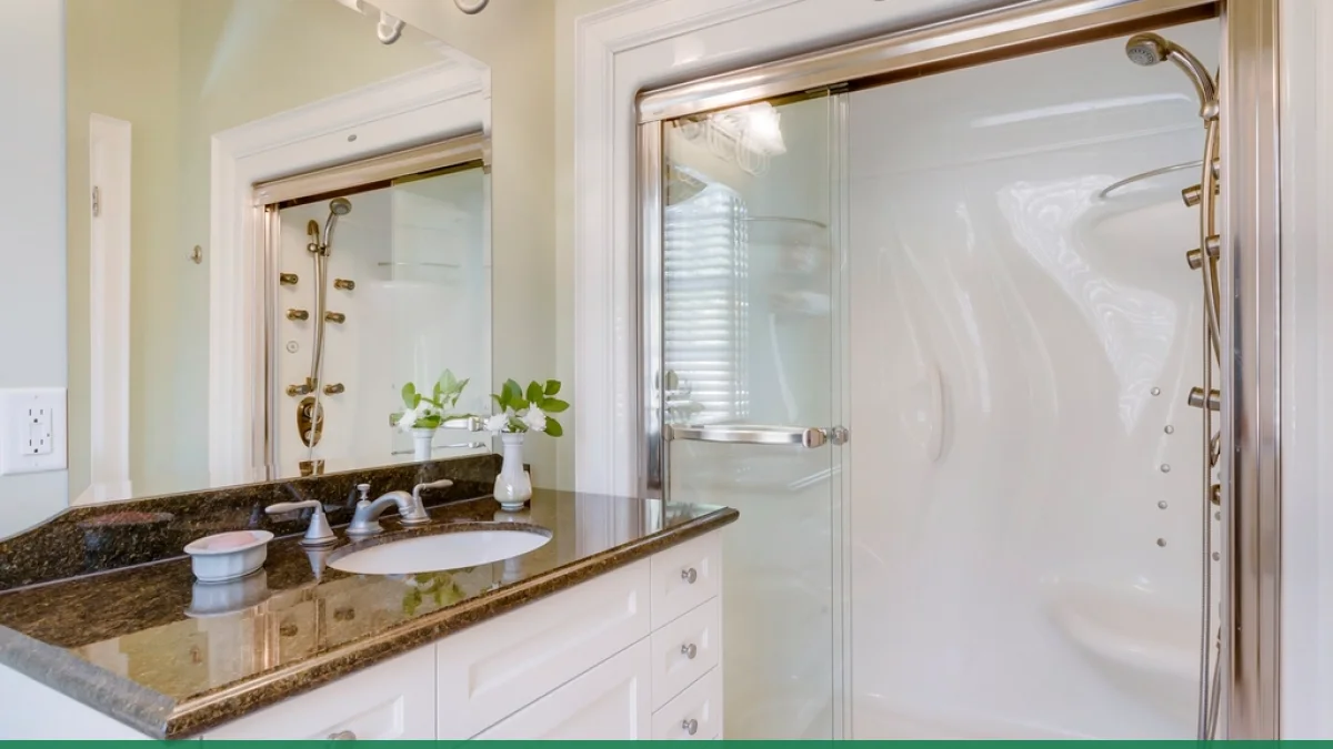 A modern bathroom with glass shower and easy-clean wall finishes